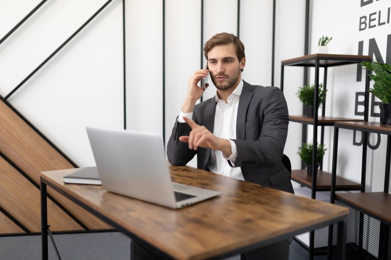 man talks on the phone