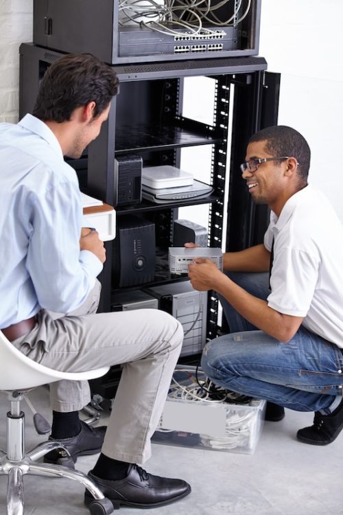 two people installing the internet