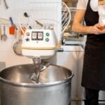 baker with flour at the bakery