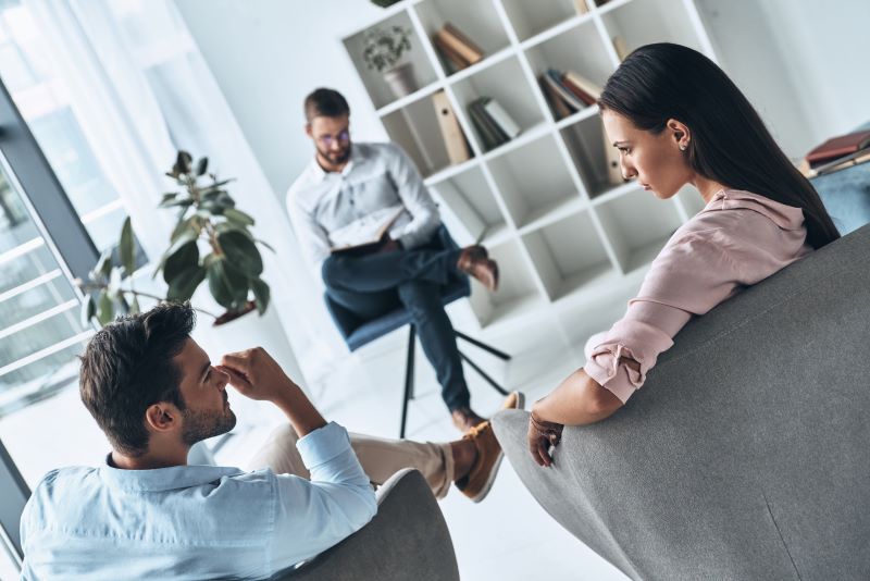 helping young married couple talking