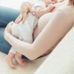 mother breastfeeding her child