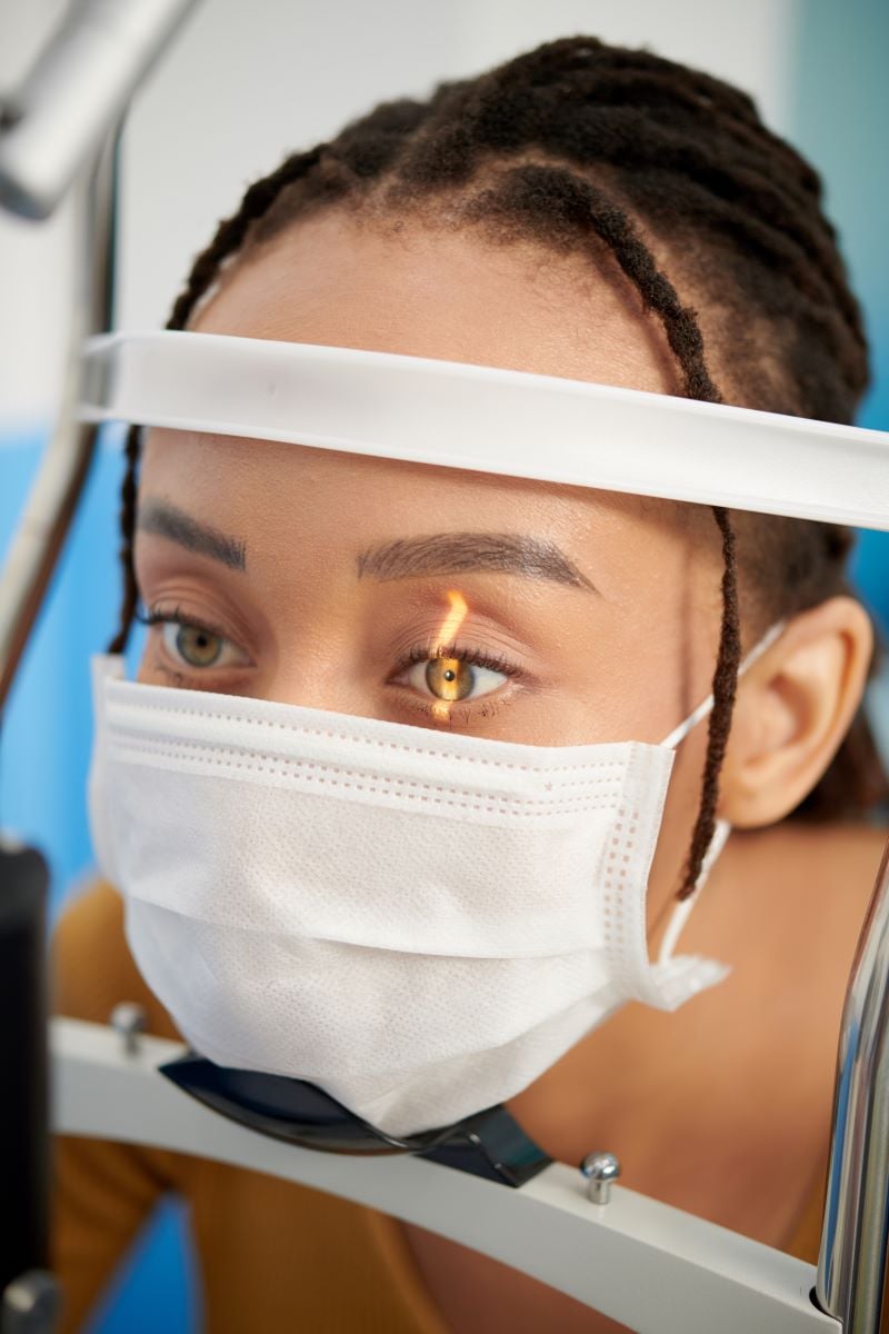 patient having her eyes examined