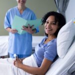 smiling female doctor and her patient