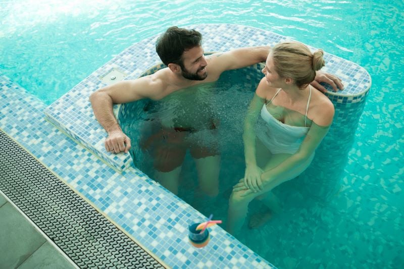 couple enjoying bubble bath