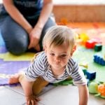 babysitter plays with a little girl