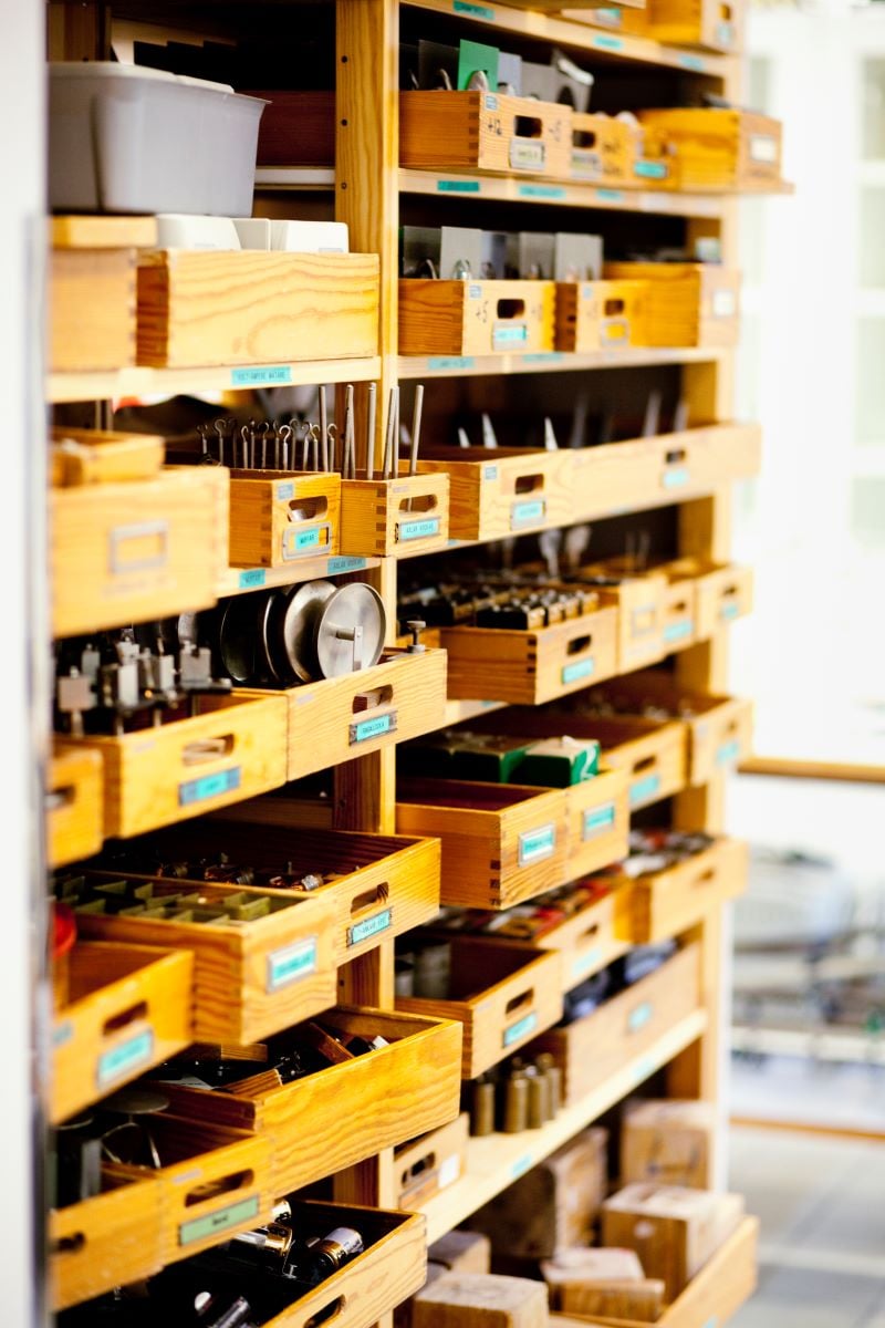 spare parts in wooden drawers