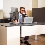 young businessman using laptop