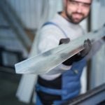 man holds metal