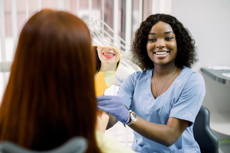 patient looking at her smile