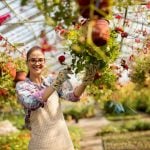 woman working with spring flowers