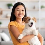 woman posing with her dog