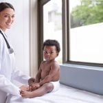 pediatrician and her little patient