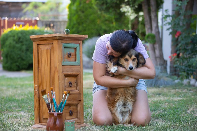 woman sitting with her dog