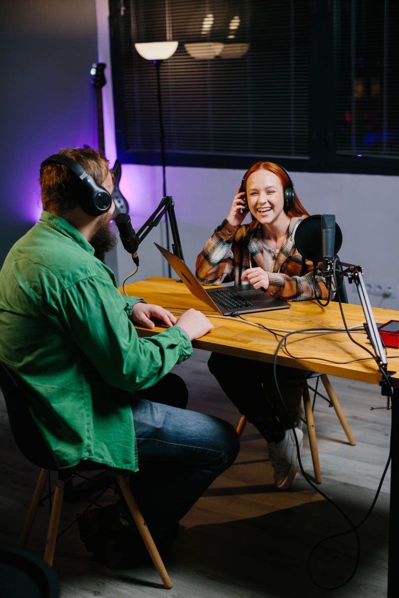 a podcast host and a guest have fun chatting